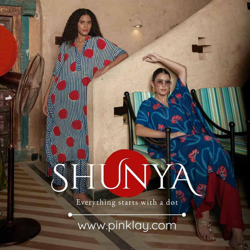 Pinklay’s handcrafted indigo collection – dabu dyed, travel-friendly women’s clothing for modern living.